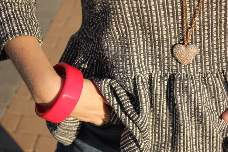 Allie's red bangle and heart necklace